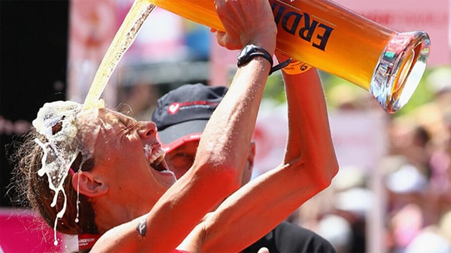 Chrissie Wellington celebrating win at Challenge Roth 2011