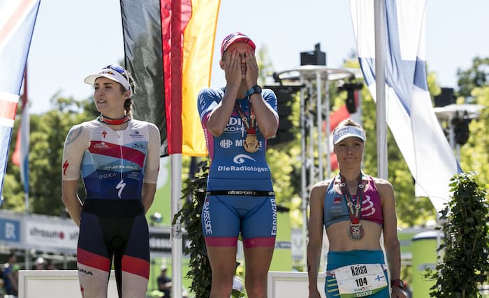 ROTH, GERMANY - JULY 01: (L-R) Lucy Charles of Great Britain, Daniela Saemmler of Germany and Kaisa Sali pose for a picture during the flower ceremony of the DATEV Challenge Roth 2018 on July 1, 2018 in Roth, Germany. (Photo by Jan Hetfleisch/Getty Images)