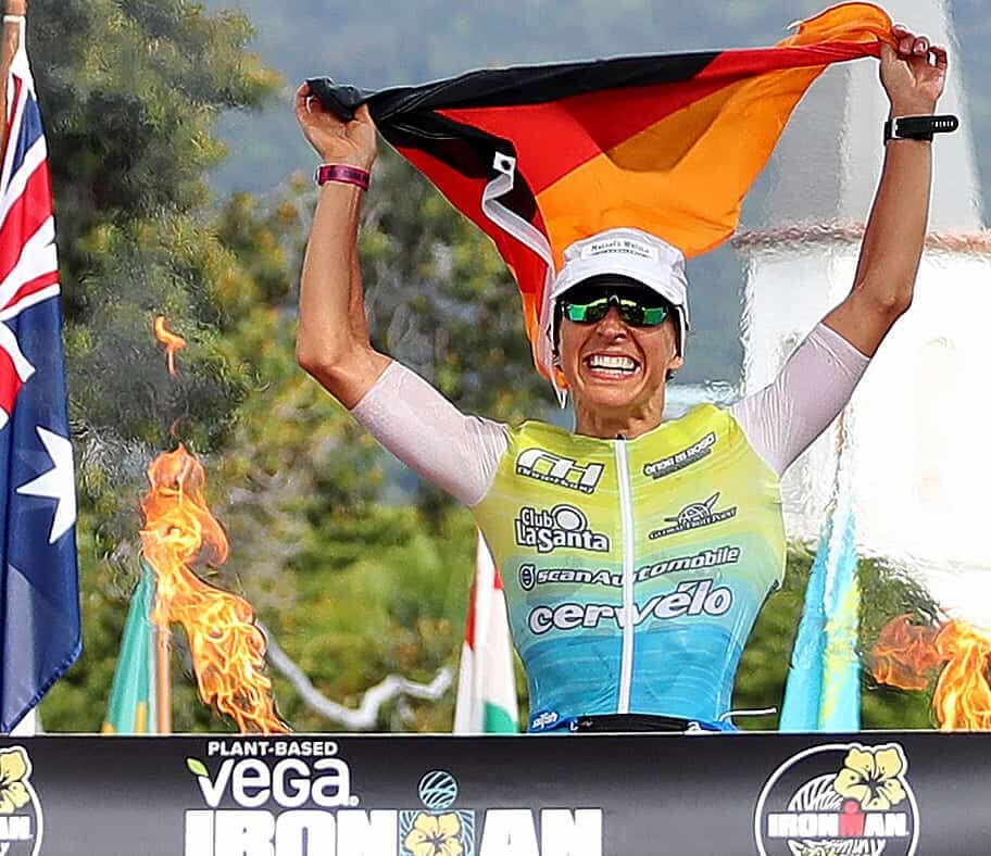 KAILUA KONA, HAWAII - OCTOBER 12: Anne Haug of Germany celebrates after winning the Ironman World Championships on October 12, 2019 in Kailua Kona, Hawaii. (Photo by Tom Pennington/Getty Images for IRONMAN)