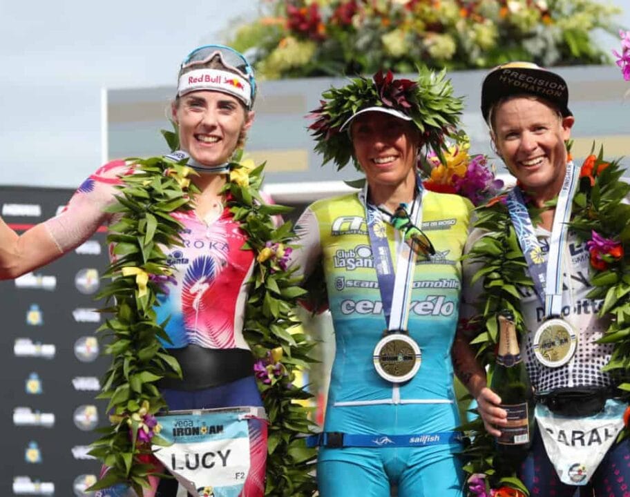 KAILUA KONA, HAWAII - OCTOBER 12: Lucy Charles-Barkley (2nd), Anne Haug (1st) and Sarah Crawley (3rd) celebrate after the Ironman World Championships on October 12, 2019 in Kailua Kona, Hawaii. (Photo by Tom Pennington/Getty Images for IRONMAN)