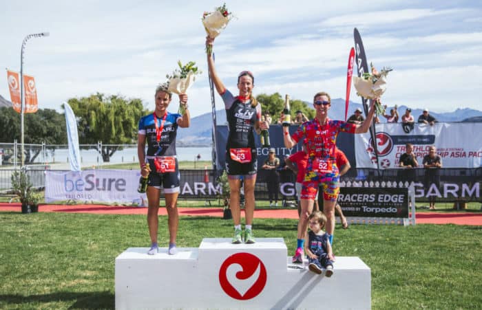 Hannah Wells (L), Radka Kahlefeldt, and Meredith Kessler, the professional Women's podium for the Integrity Homes Challenge Wanaka/Challenge Asia Pacific Championships 2020