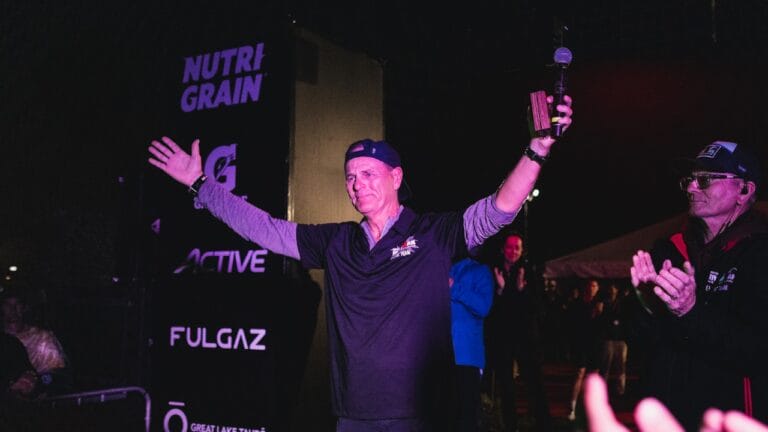 Legendary IRONMAN announcer Mike Reilly hangs up his microphone at IRONMAN New Zealand photo credit Cameron Mackenzie