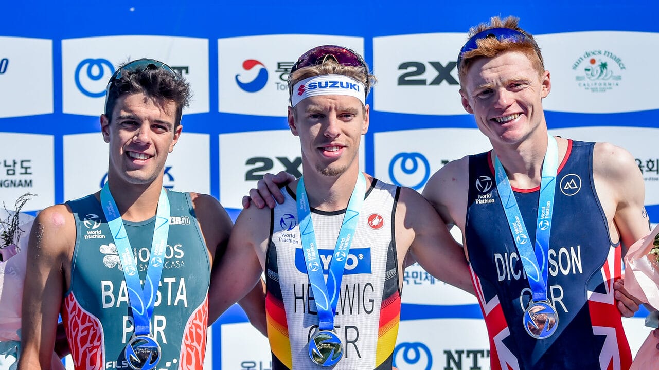 World Triathlon Cup Tongyeong podium featuring Tim Hellwig, Ricardo Batista and Samuel Dickinson