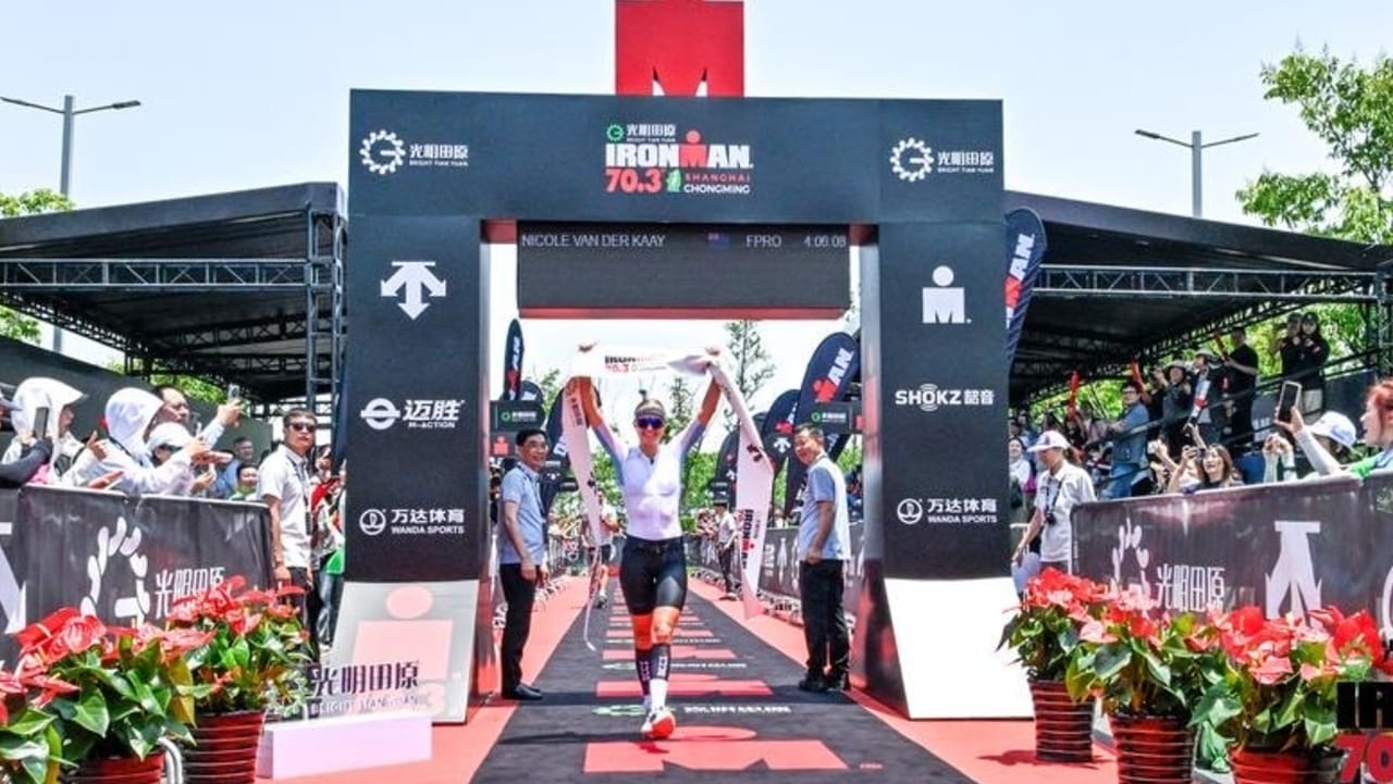 Nicole Van Der Kaay winning IRONMAN 70.3 Shanghai Chongming